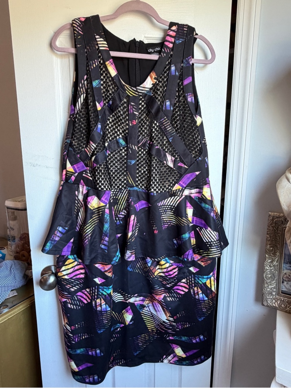 City Chic brand peplum dress featuring a colorful geometric print
